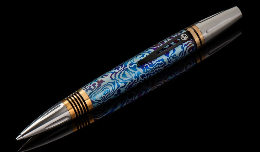 William Henry Caribe pen features a barrel sculpted and hand-finished from stylish patterned and anodized titanium